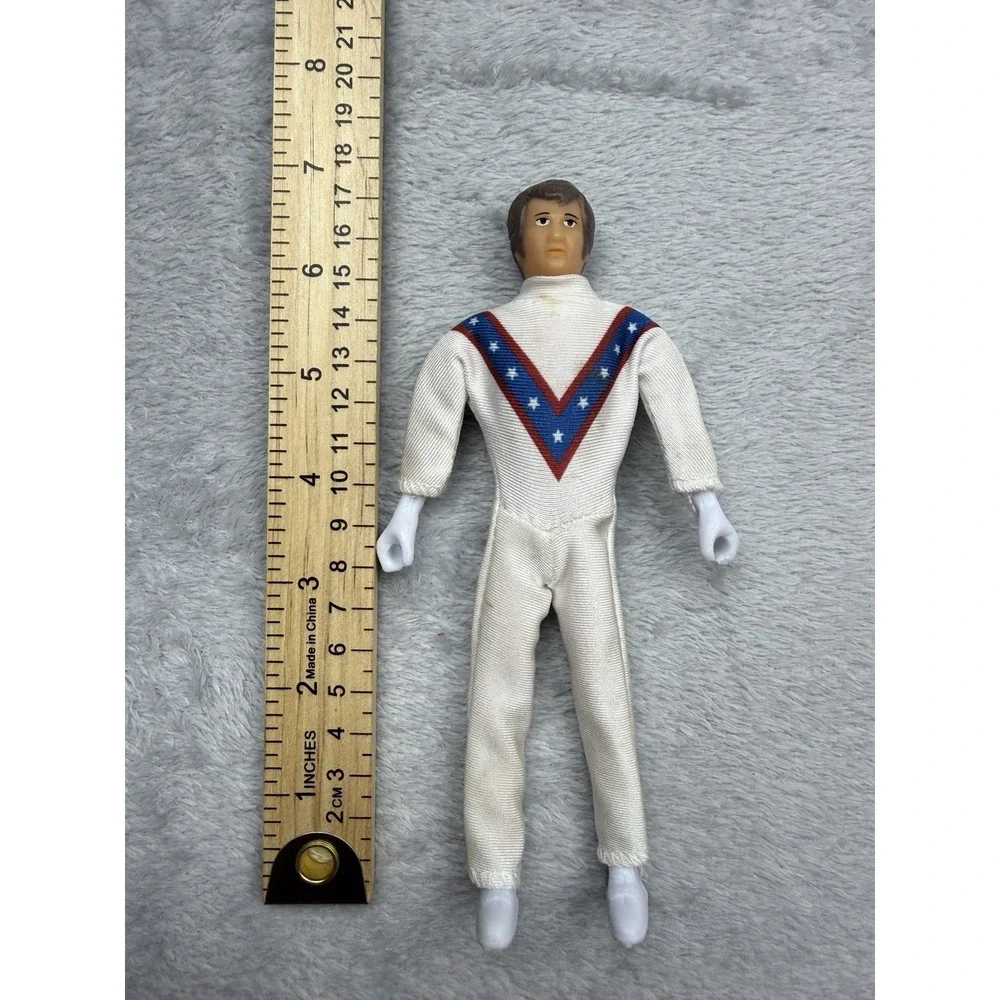 Vintage 7 in Action Figure White Jumpsuit Red/Blue V Star Chest Design